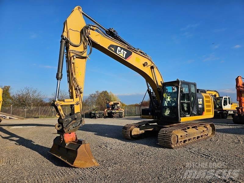 CAT 323 EL Pásová rýpadla