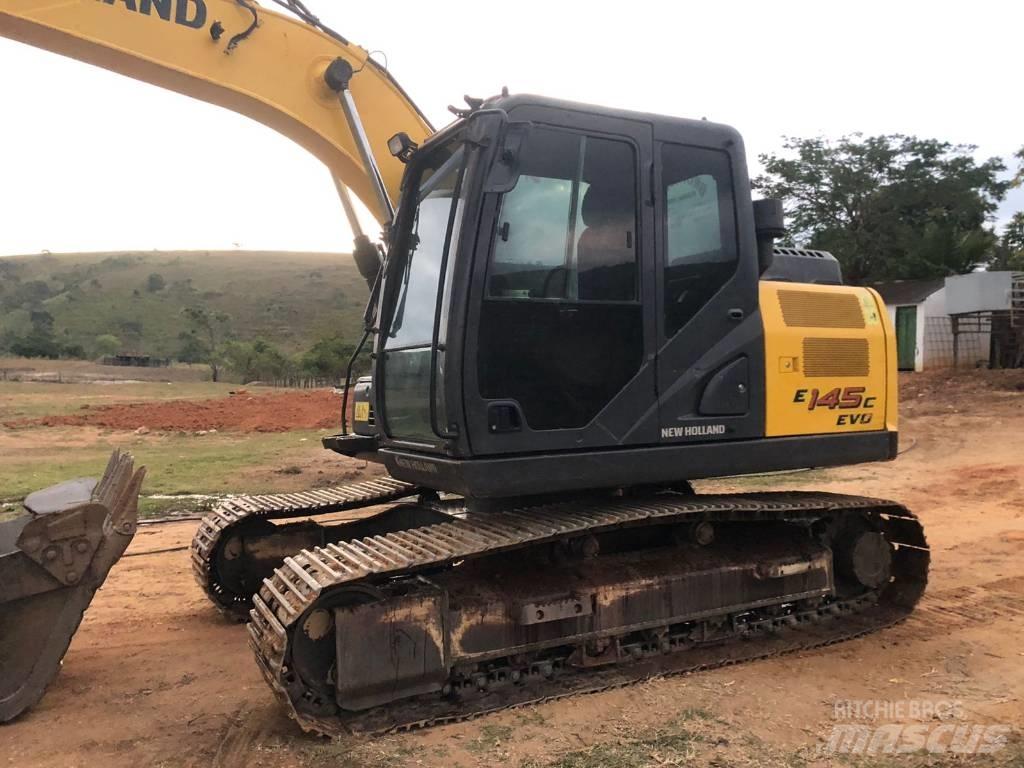 New Holland E 145 Pásová rýpadla