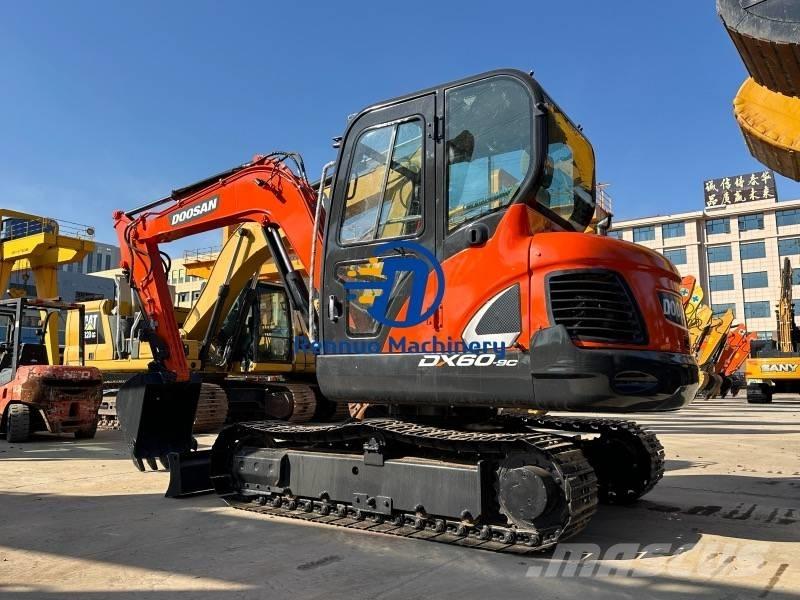 Doosan DX 60 Pásová rýpadla
