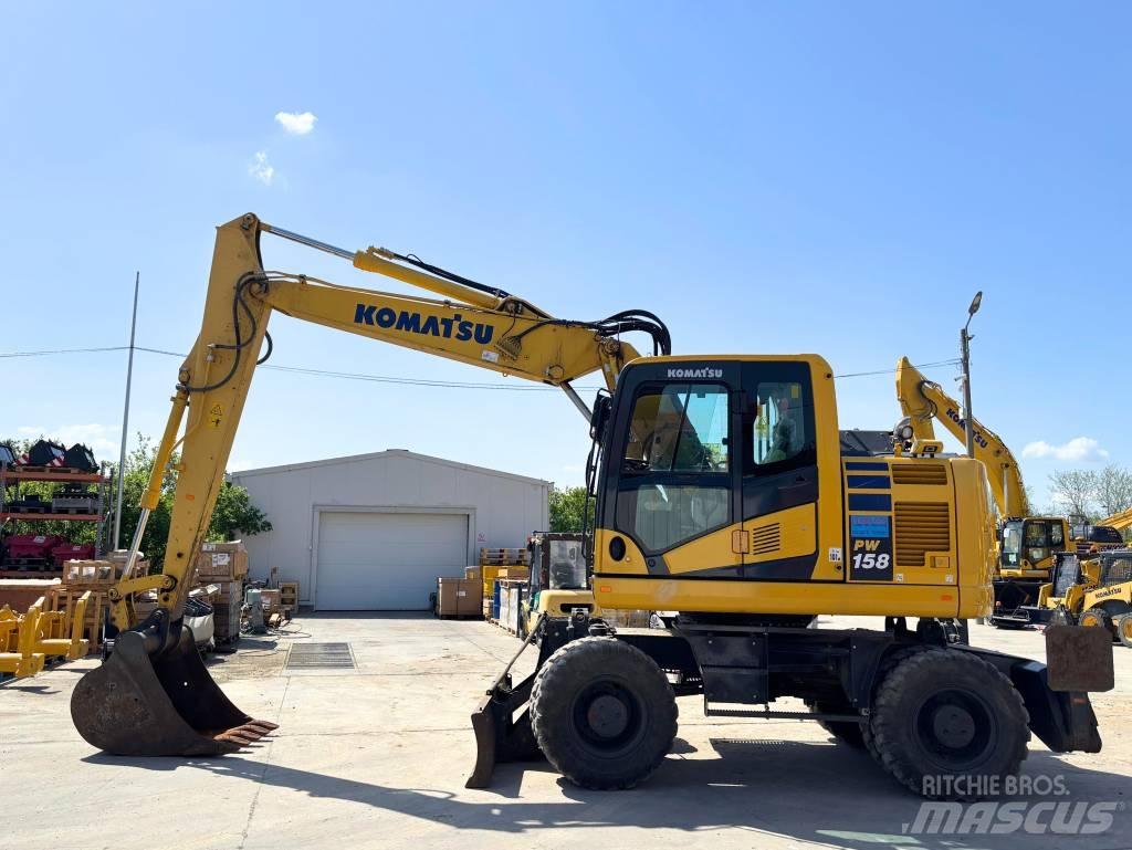 Komatsu PW 158-11 Kolová rýpadla