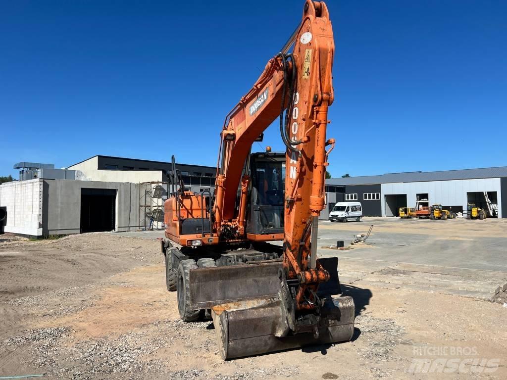 Doosan DX 140 W Kolová rýpadla