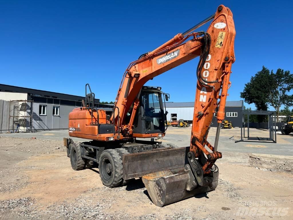 Doosan DX 140 W Kolová rýpadla