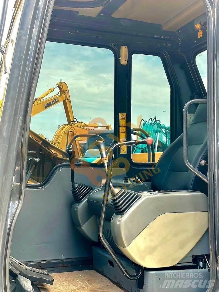 Komatsu PC 60 Pásová rýpadla