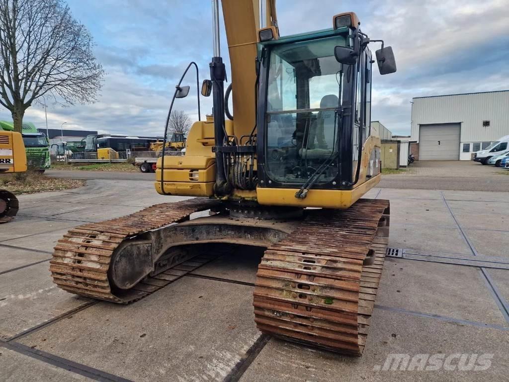 CAT 323d Pásová rýpadla