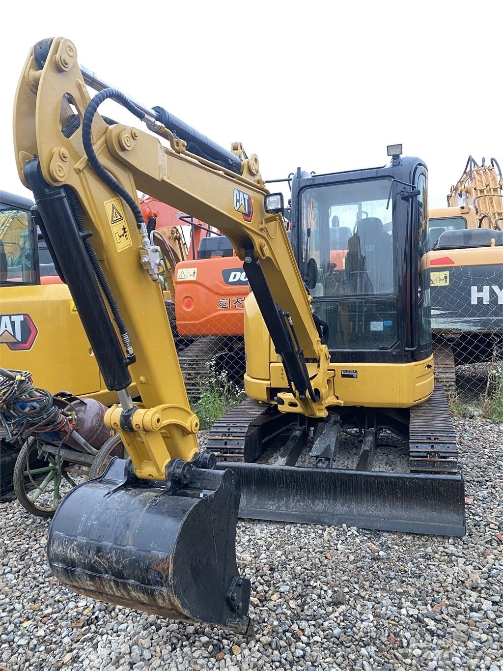 CAT 303E Pásová rýpadla
