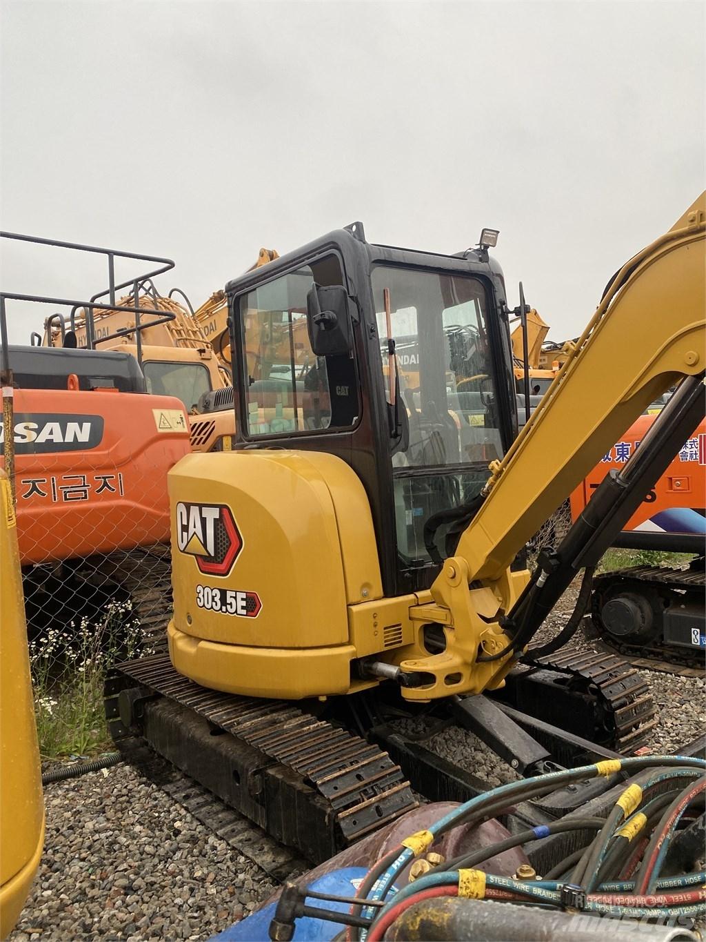 CAT 303E Pásová rýpadla