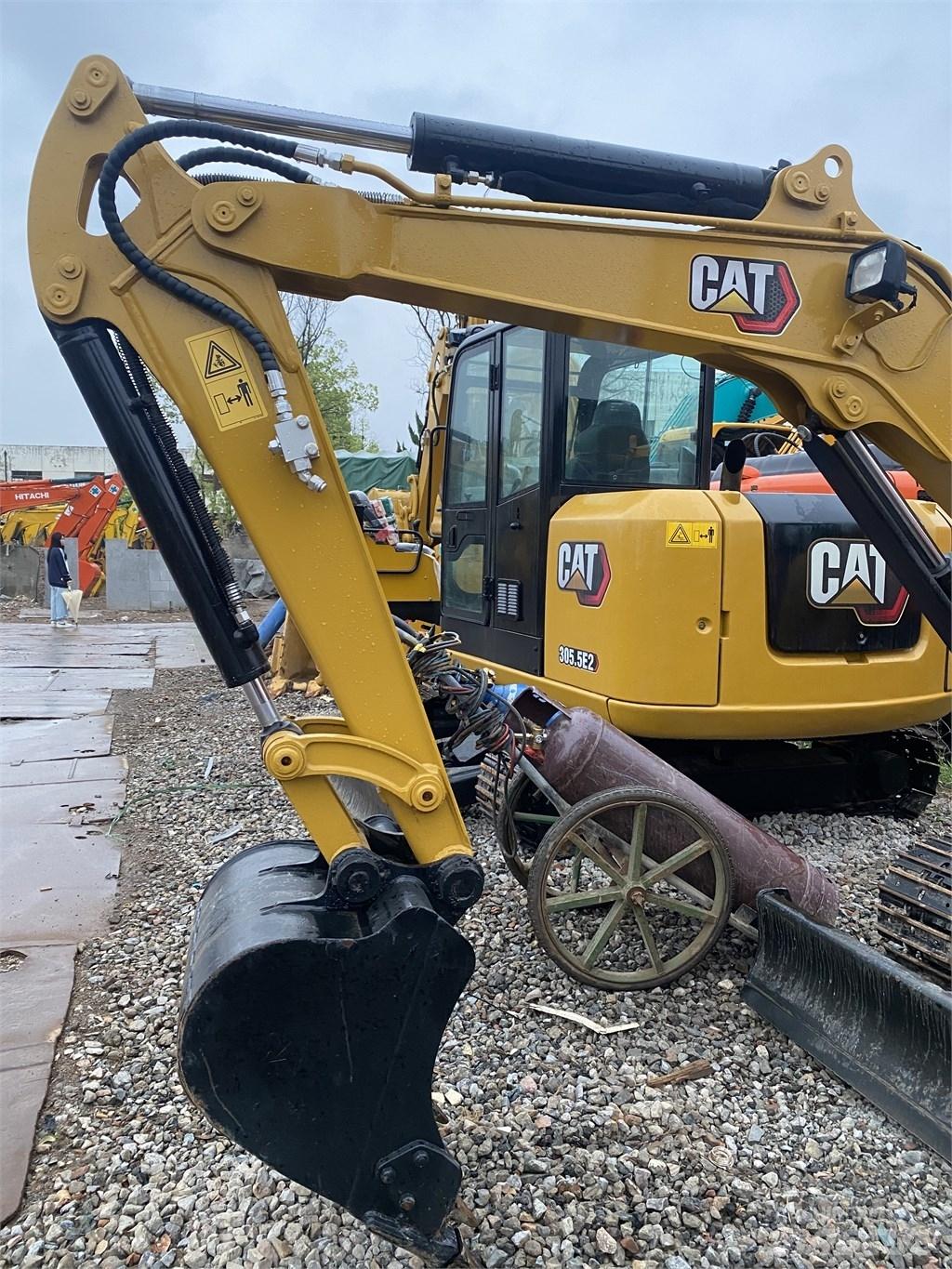 CAT 303E Pásová rýpadla