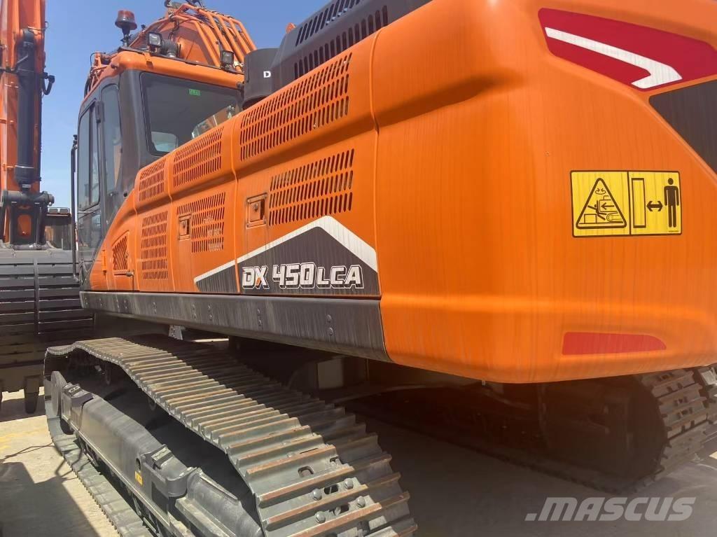 Develon DX 450 Pásová rýpadla