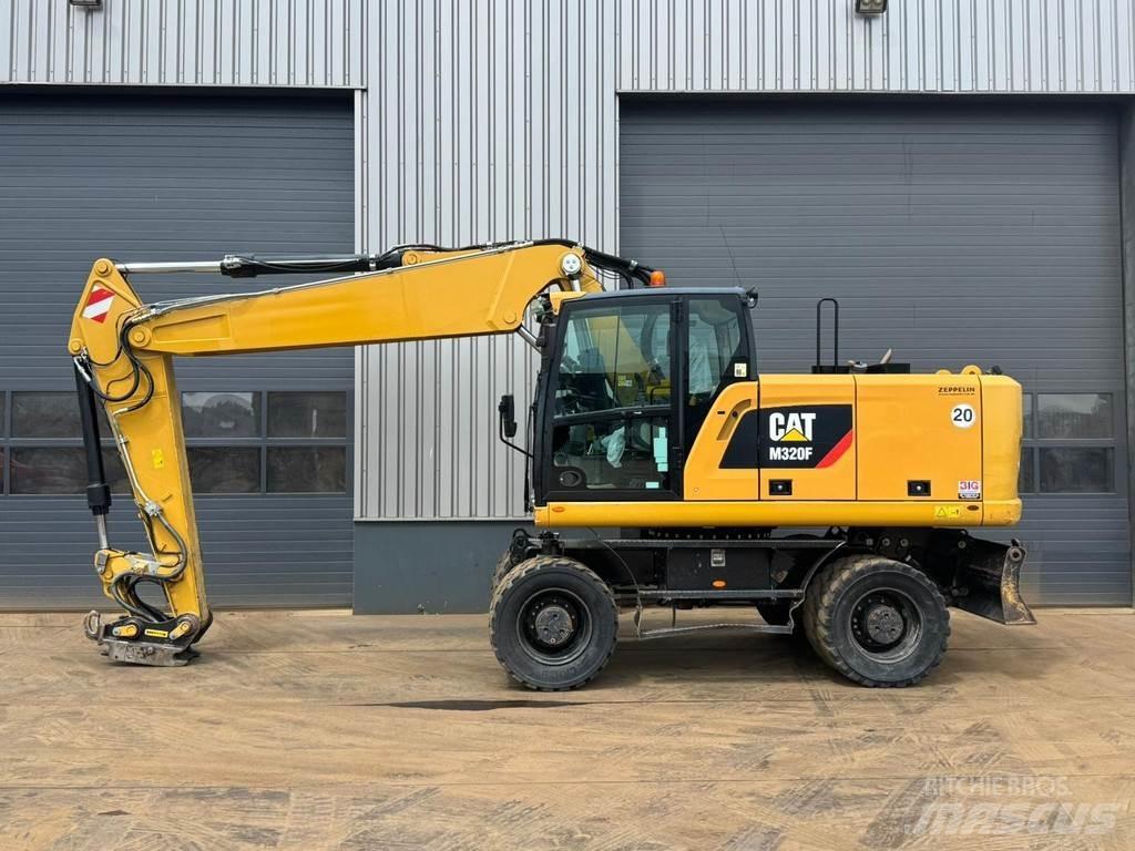 CAT M320F Kolová rýpadla