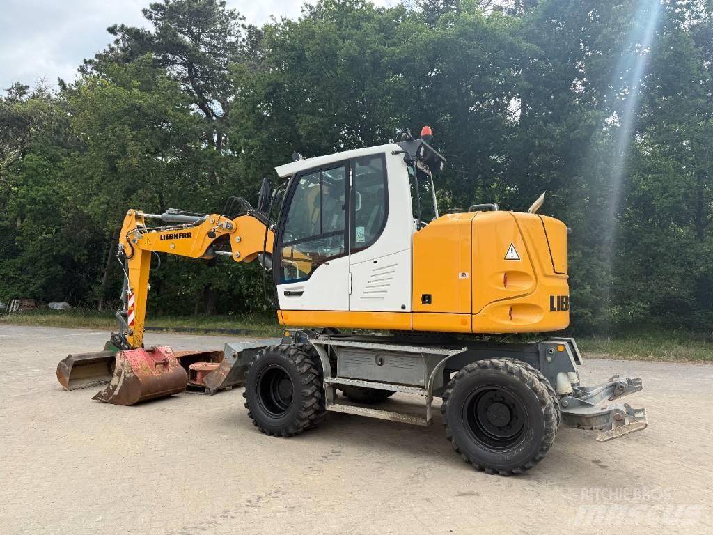 Liebherr A 910 Comp Kolová rýpadla