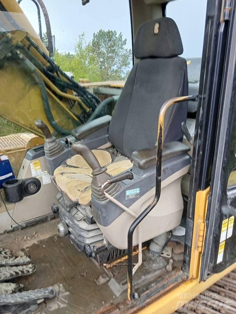 CAT 318 C L Pásová rýpadla