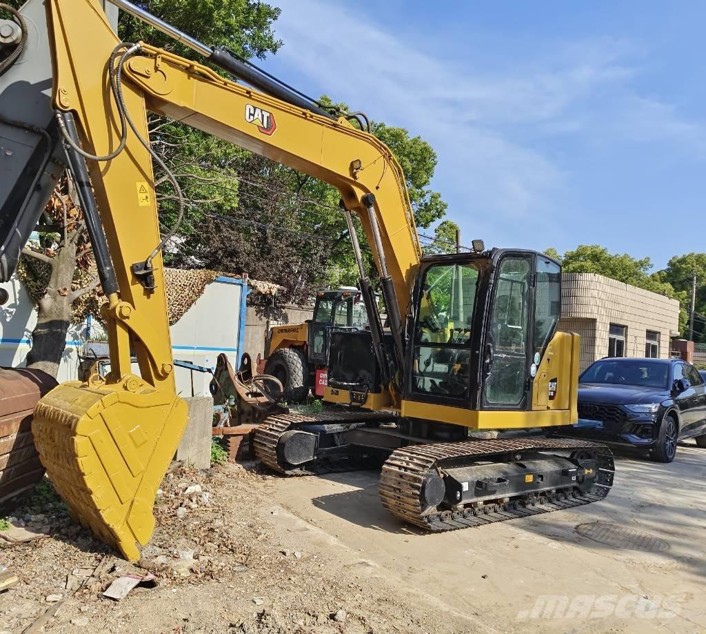 CAT 310 Pásová rýpadla