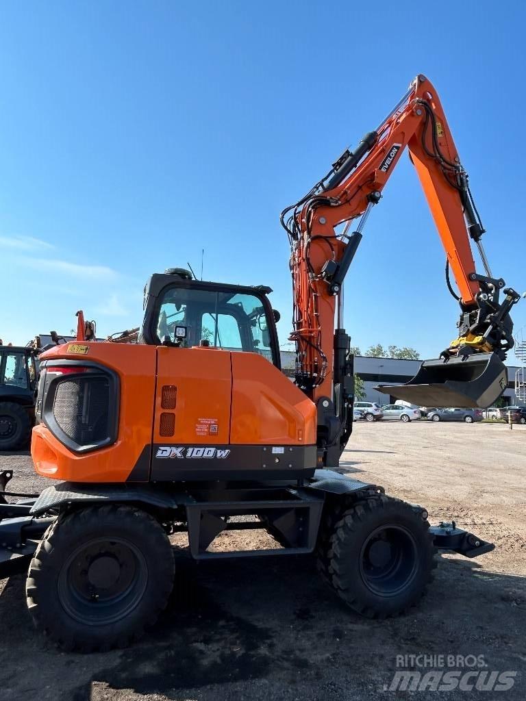 Develon DX 100 W-7 Kolová rýpadla