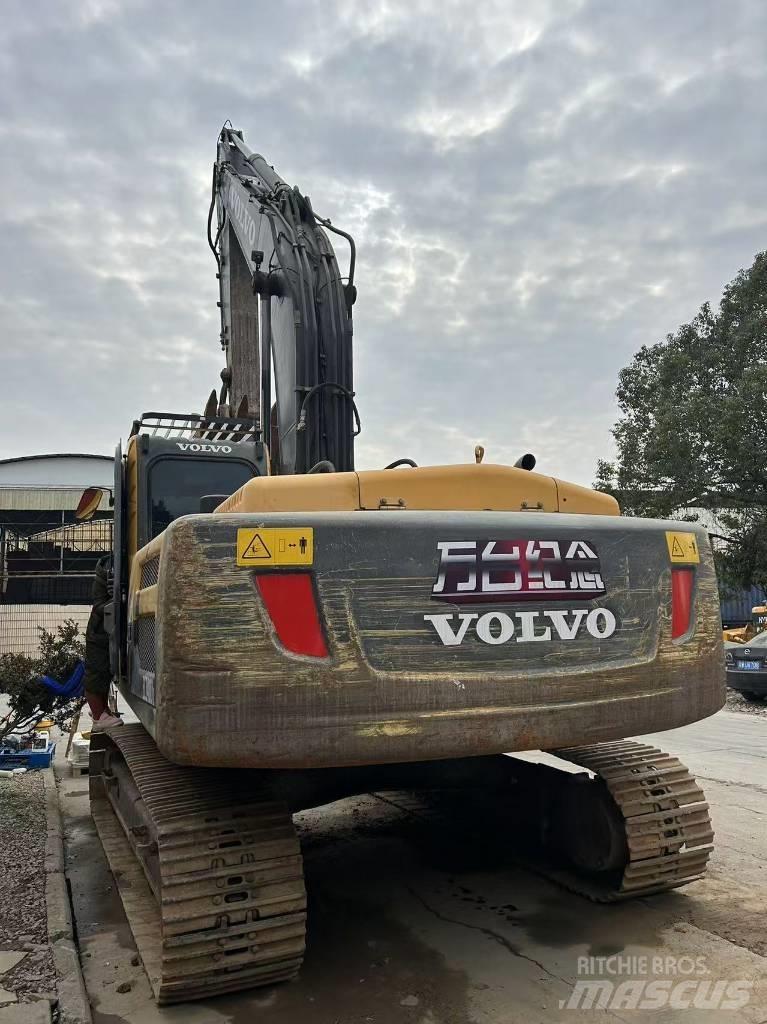Volvo 240DL Pásová rýpadla