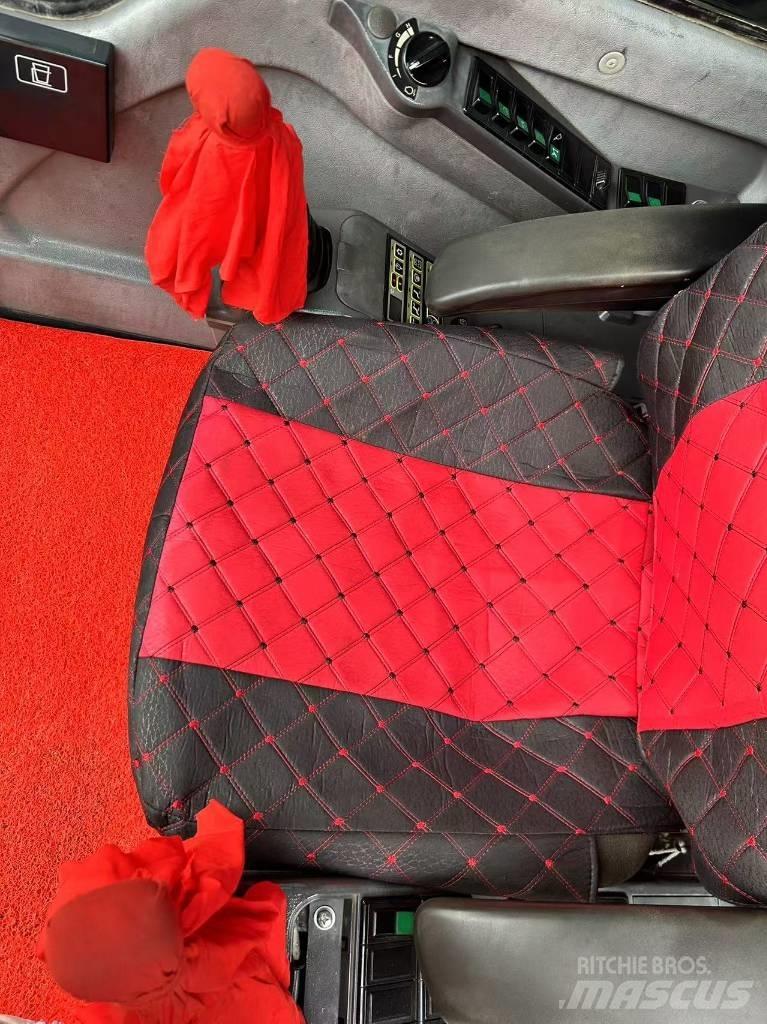 Volvo 240DL Pásová rýpadla