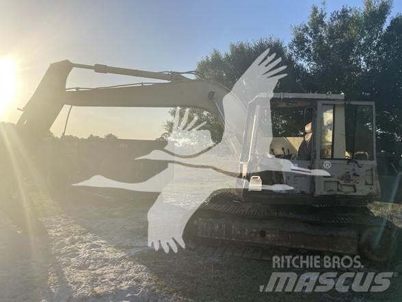 CAT 235B Pásová rýpadla
