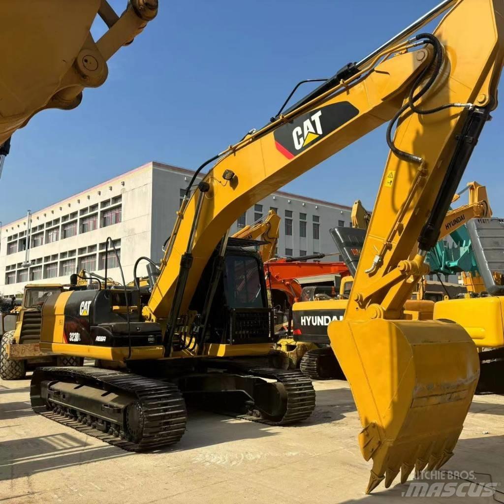 CAT 323 D L Pásová rýpadla