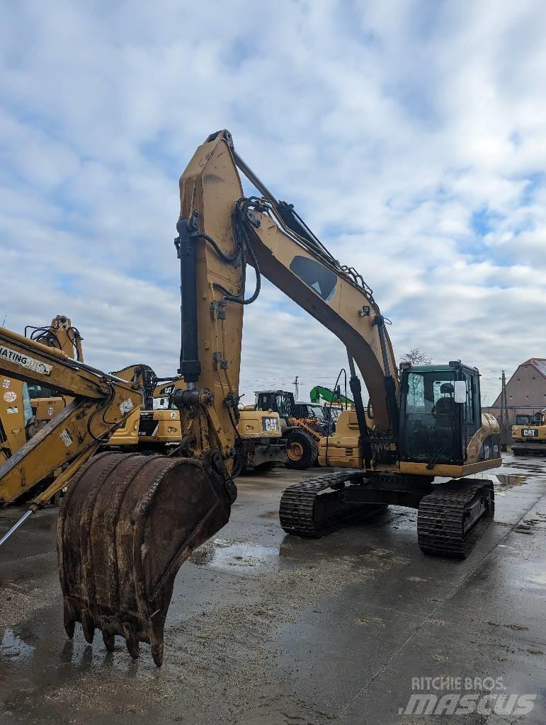 CAT 323 D Pásová rýpadla