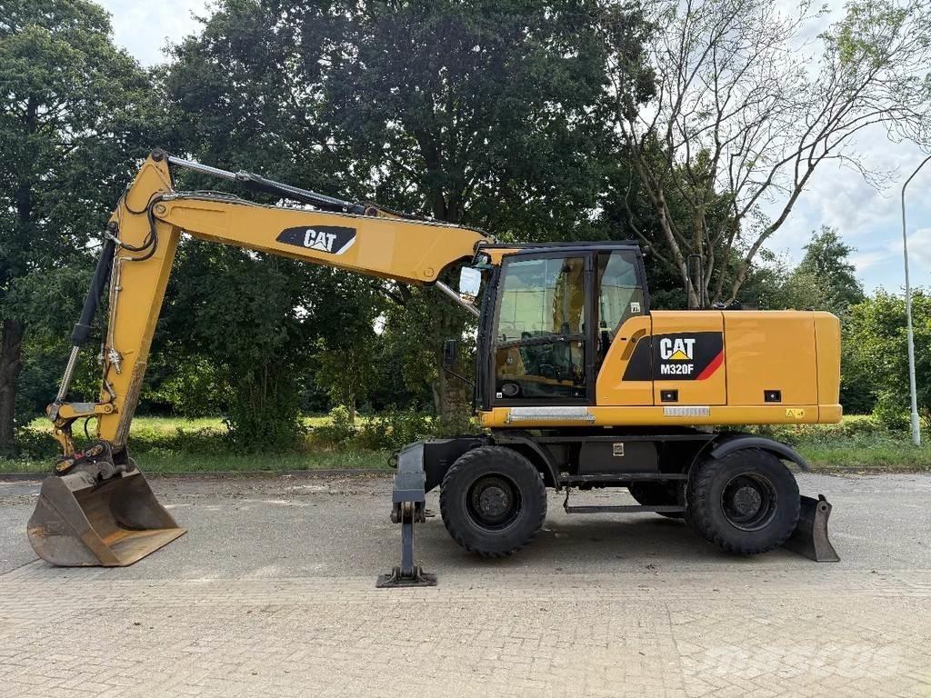CAT M320F Kolová rýpadla