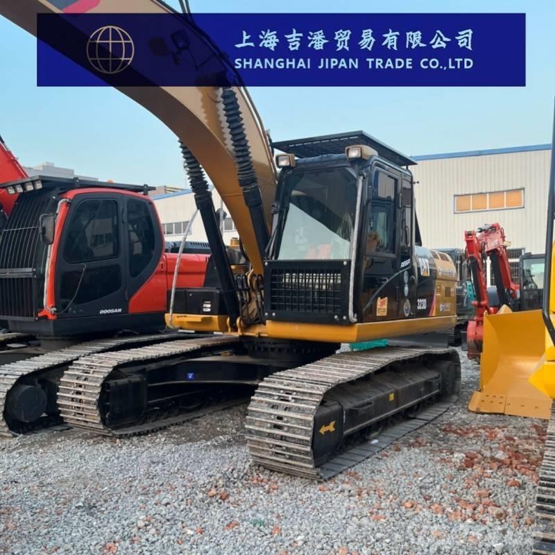 CAT 323 D Pásová rýpadla