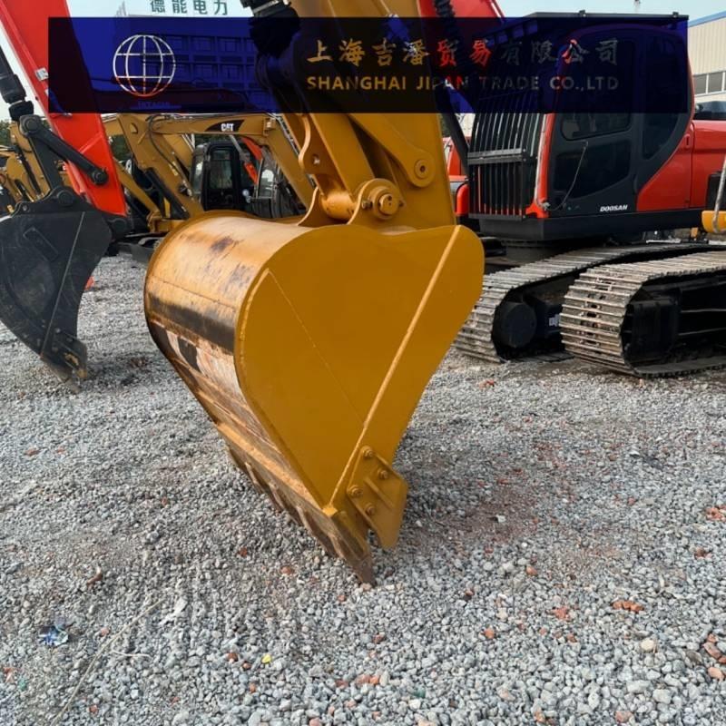 CAT 323 D Pásová rýpadla