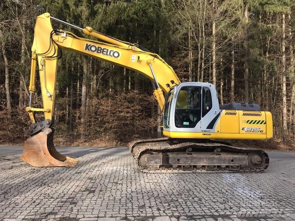 New Holland E 215 B Pásová rýpadla