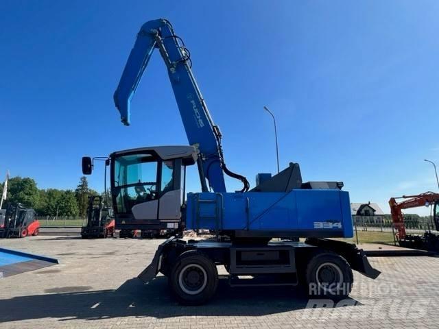 Fuchs MHL 334F Stroje pro manipulaci s odpadem