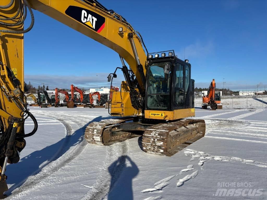 CAT 325 FL CR Pásová rýpadla