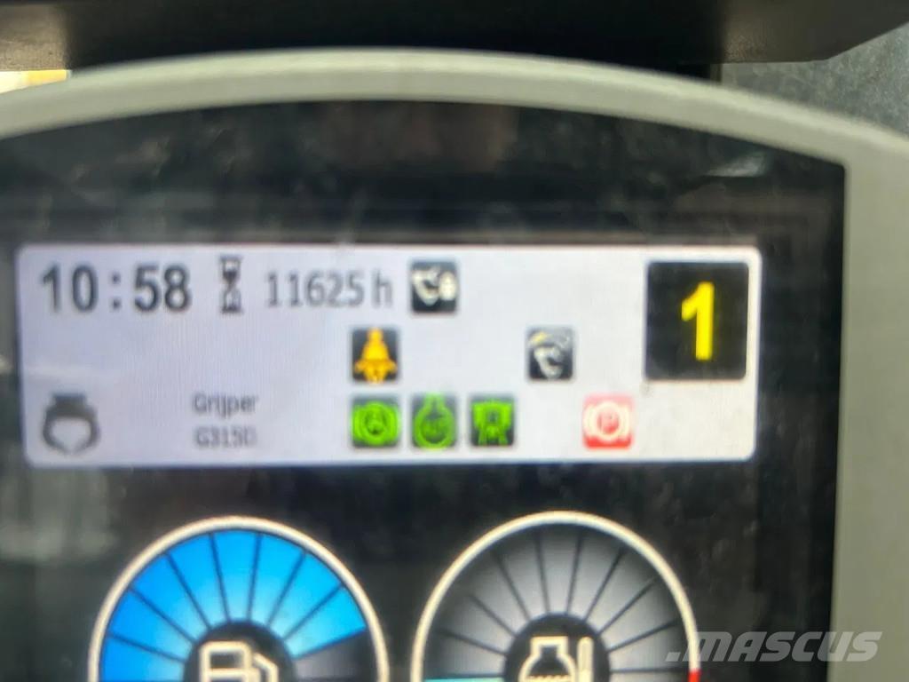 CAT MH3022 Stroje pro manipulaci s odpadem