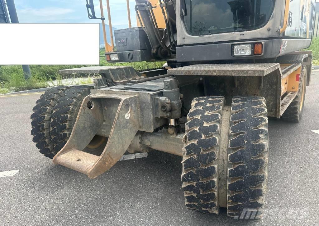 Volvo EW 140 Kolová rýpadla