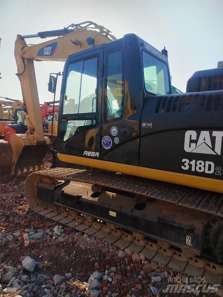 CAT 318 Pásová rýpadla