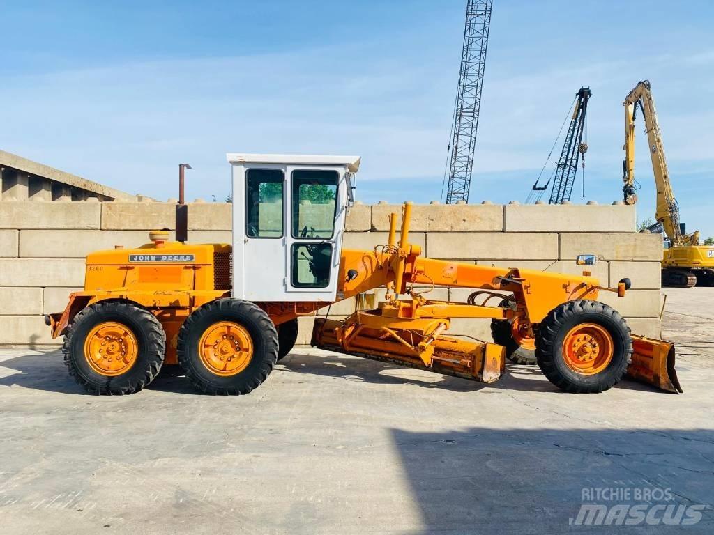 John Deere 570 A Grejdry