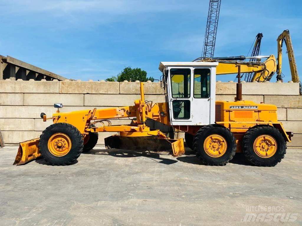 John Deere 570 A Grejdry