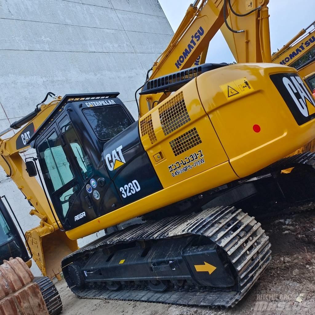 CAT 323 D Pásová rýpadla