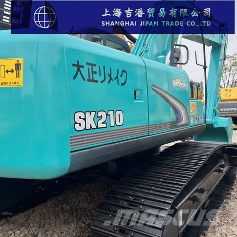 Kobelco SK 210 Pásová rýpadla