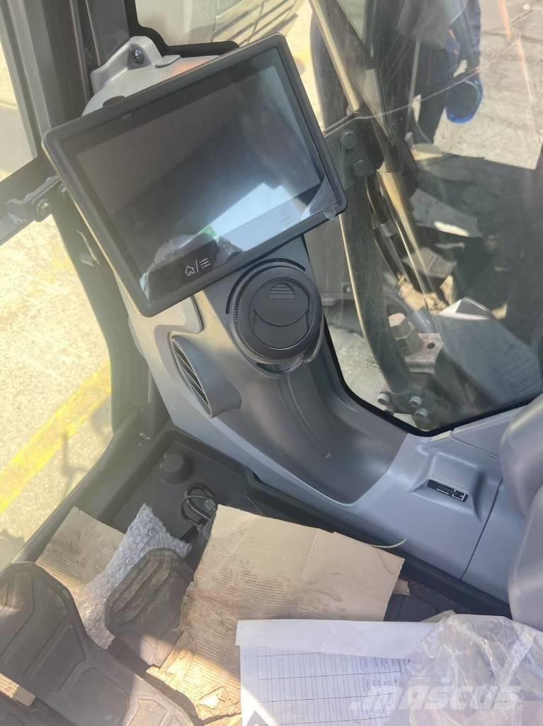 Develon DX 450 Pásová rýpadla