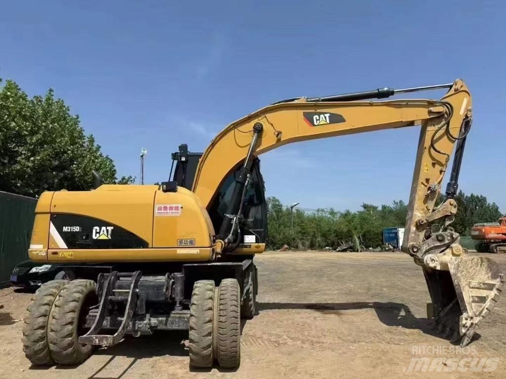 CAT M 315 D Kolová rýpadla