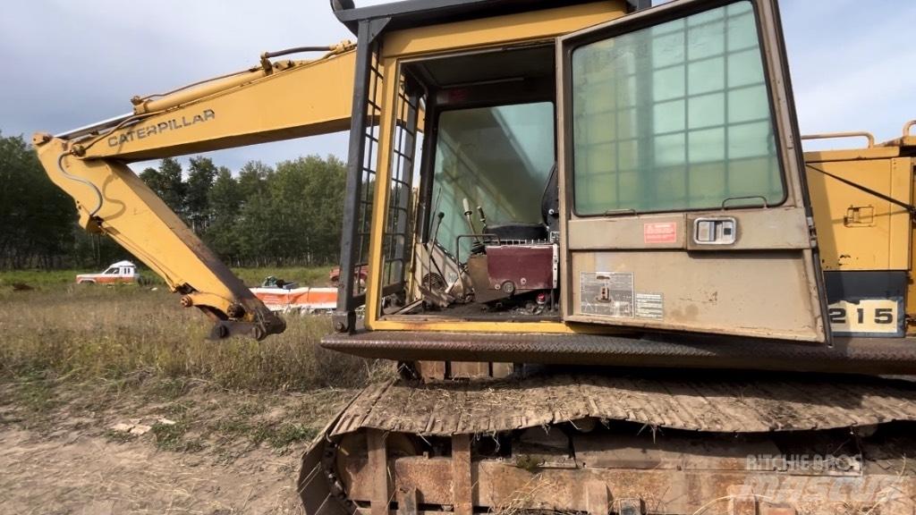 CAT 215 Pásová rýpadla