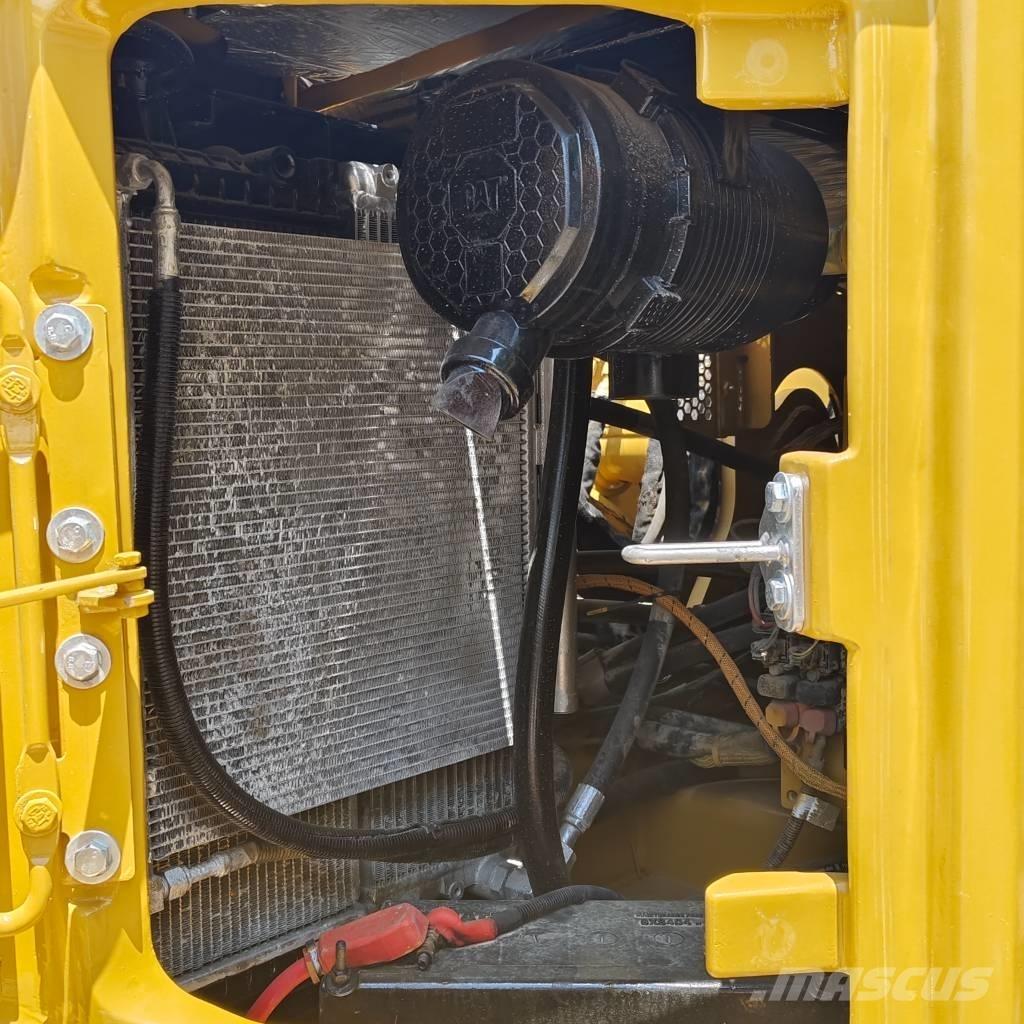 CAT 310 Pásová rýpadla