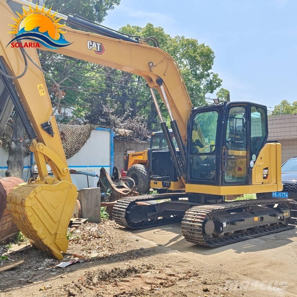 CAT 310 Pásová rýpadla