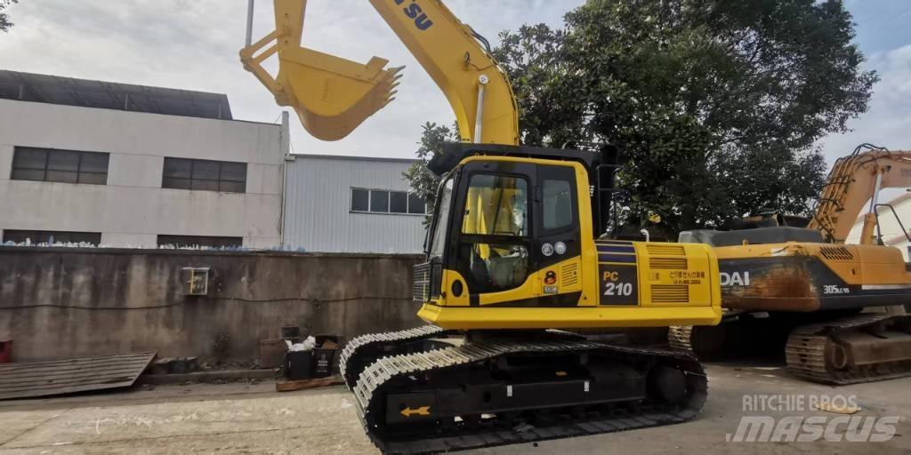 Komatsu PC 210 Pásová rýpadla