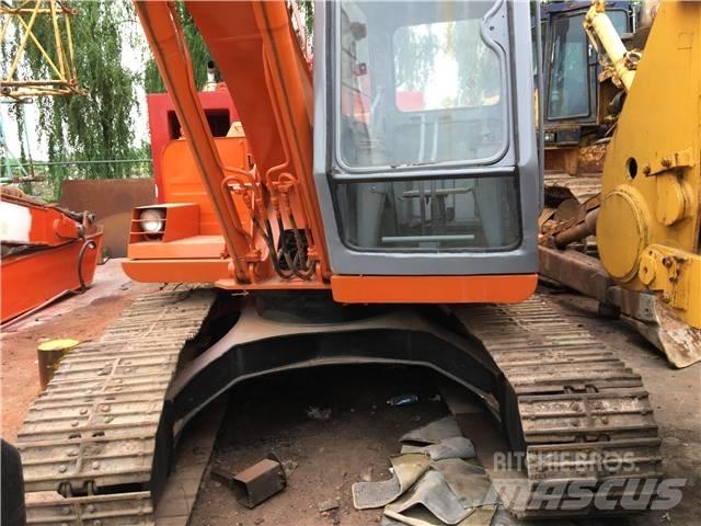 Hitachi EX 100 Pásová rýpadla
