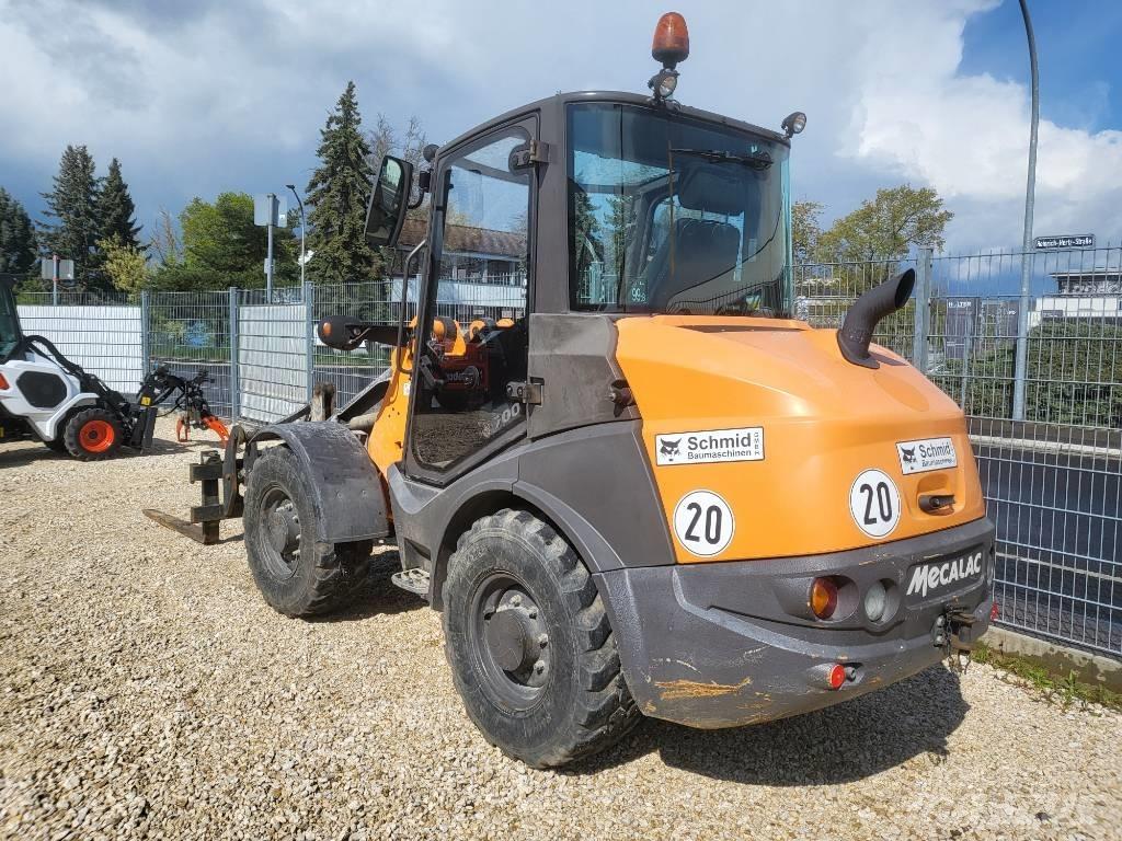 Mecalac AX 700 Kolové nakladače