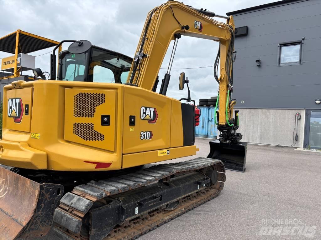 CAT 310 Pásová rýpadla