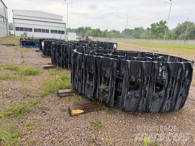 CAT 6020 new parts Pásy, řetězy a podvozek