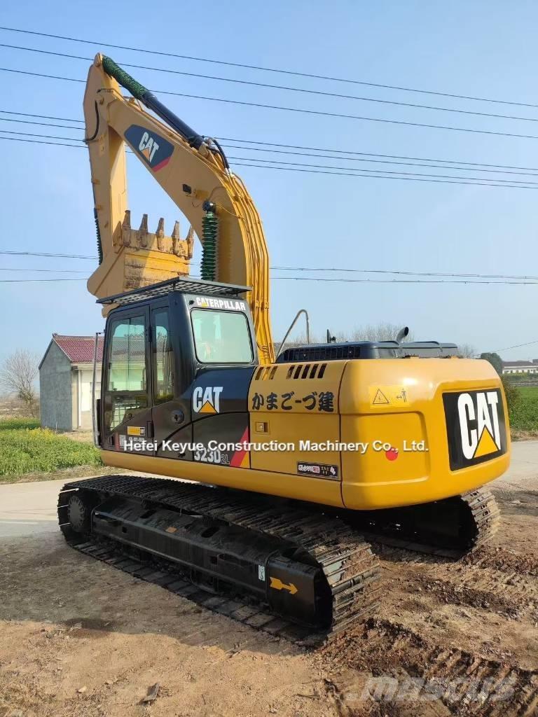 CAT 323 Pásová rýpadla
