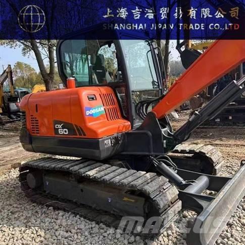Doosan DX 60 Pásová rýpadla
