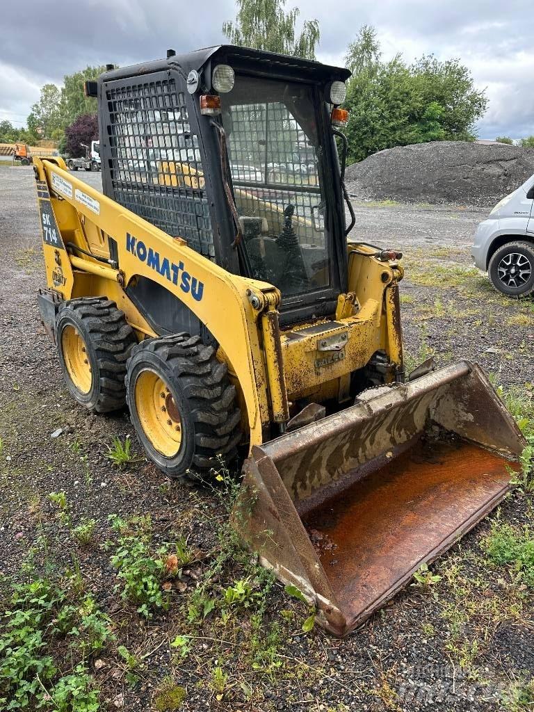 Komatsu SK 714 Smykem řízené nakladače