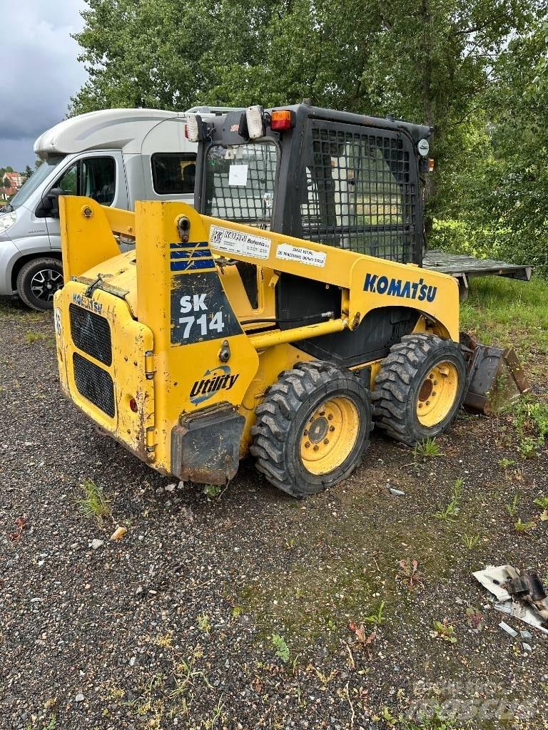 Komatsu SK 714 Smykem řízené nakladače