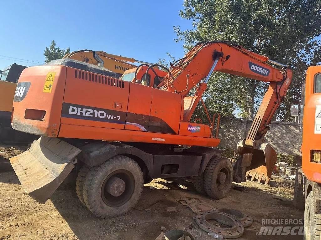 Doosan DH 210 W Kolová rýpadla